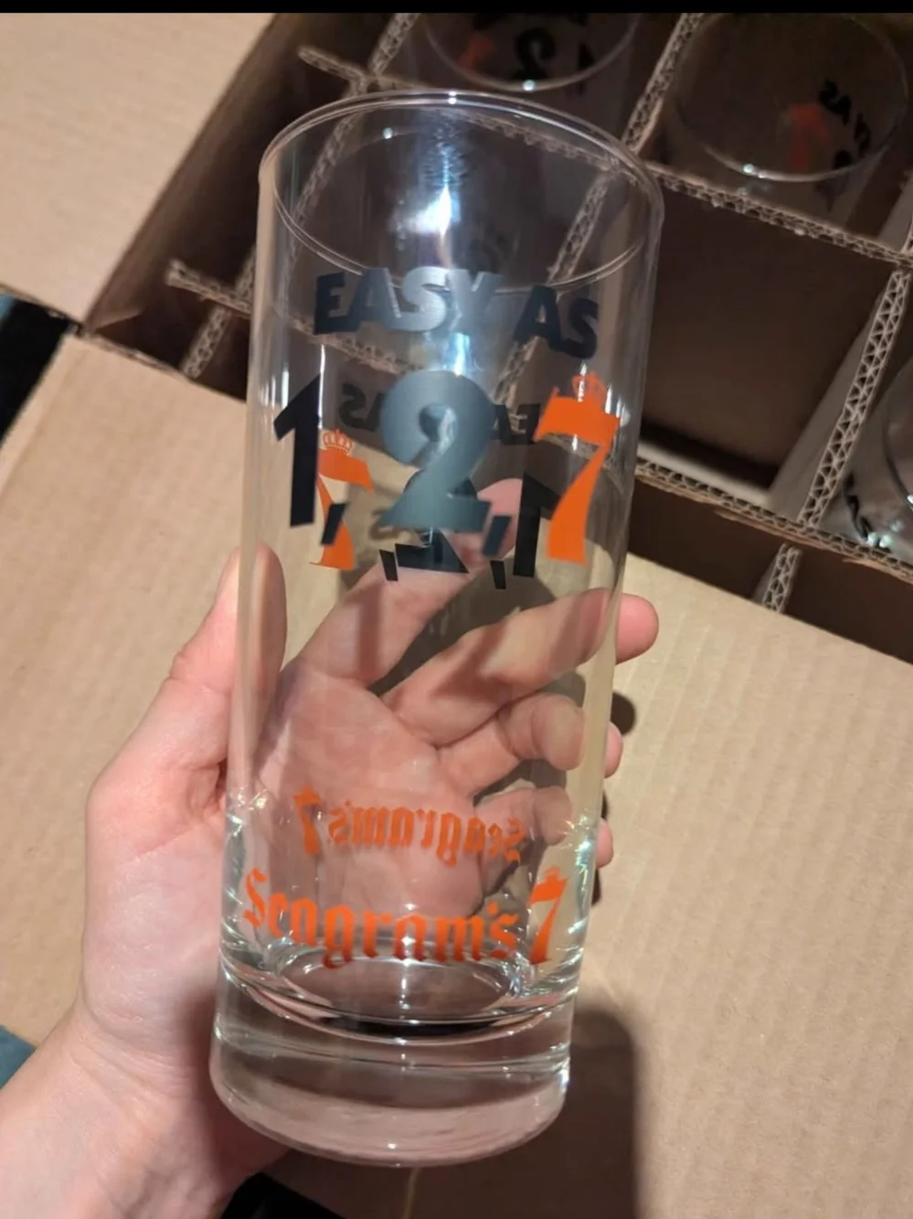 1-2-7 Tall Glass - Clear with Black & Orange Logo